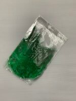 Набір натурального пір'я фазана в горох зелене 100 шт - Пір'я