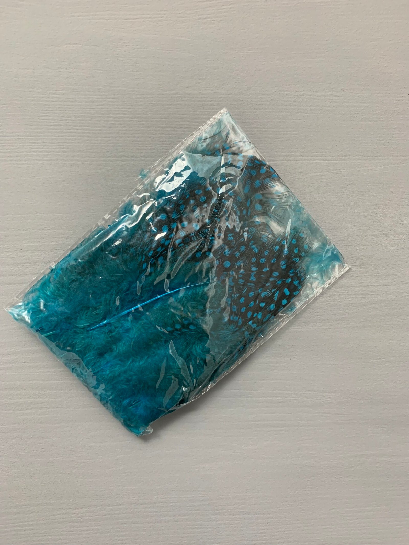 Набір натурального пір'я фазана в горох темно бірюзове 100 шт - Пір'я Набір натурального пір'я фазана в горох темно бірюзове 100 шт - Пір'я